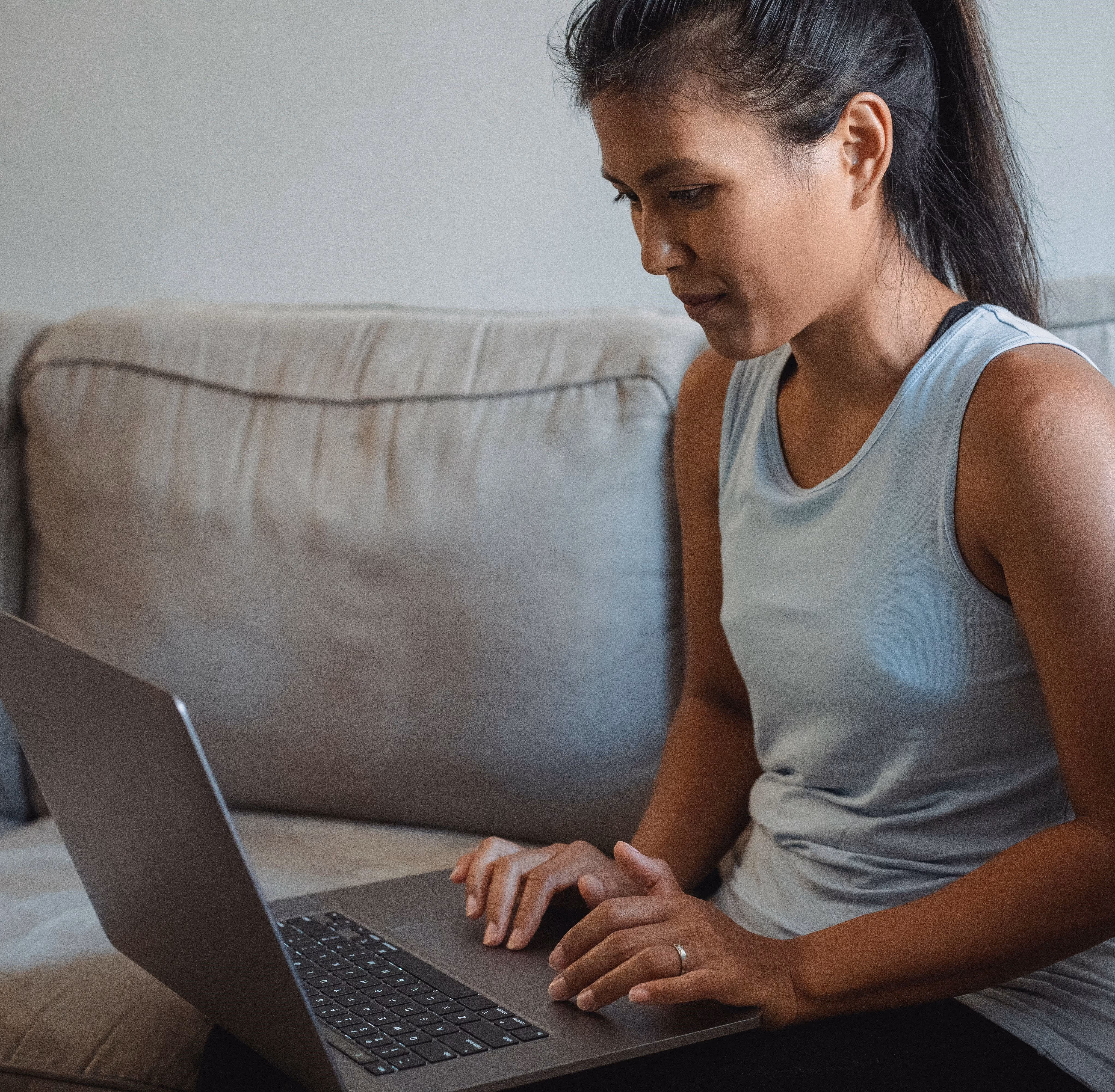 Yoga studio owner working on her marketing and yoga studio software