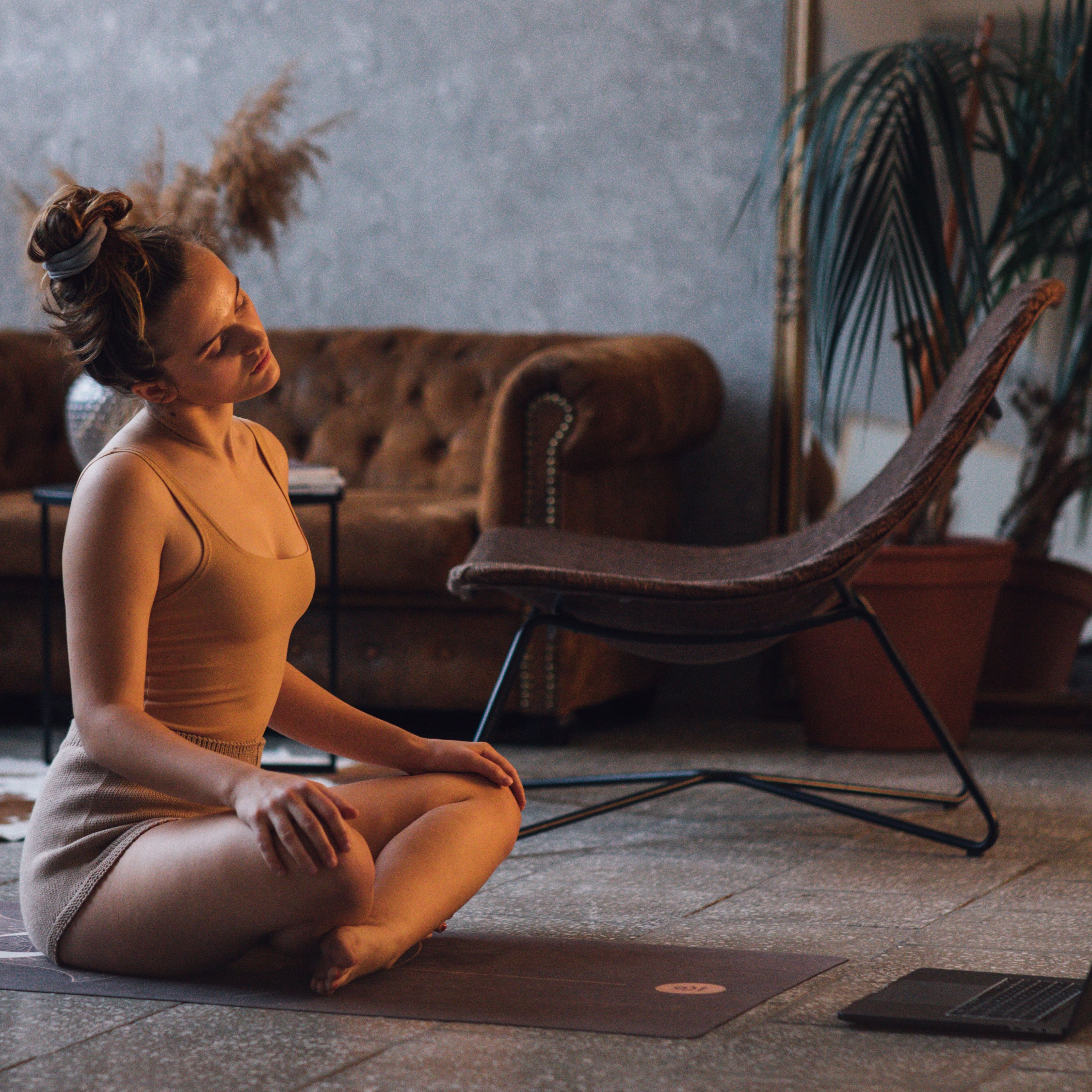 Yoga teacher at a computer