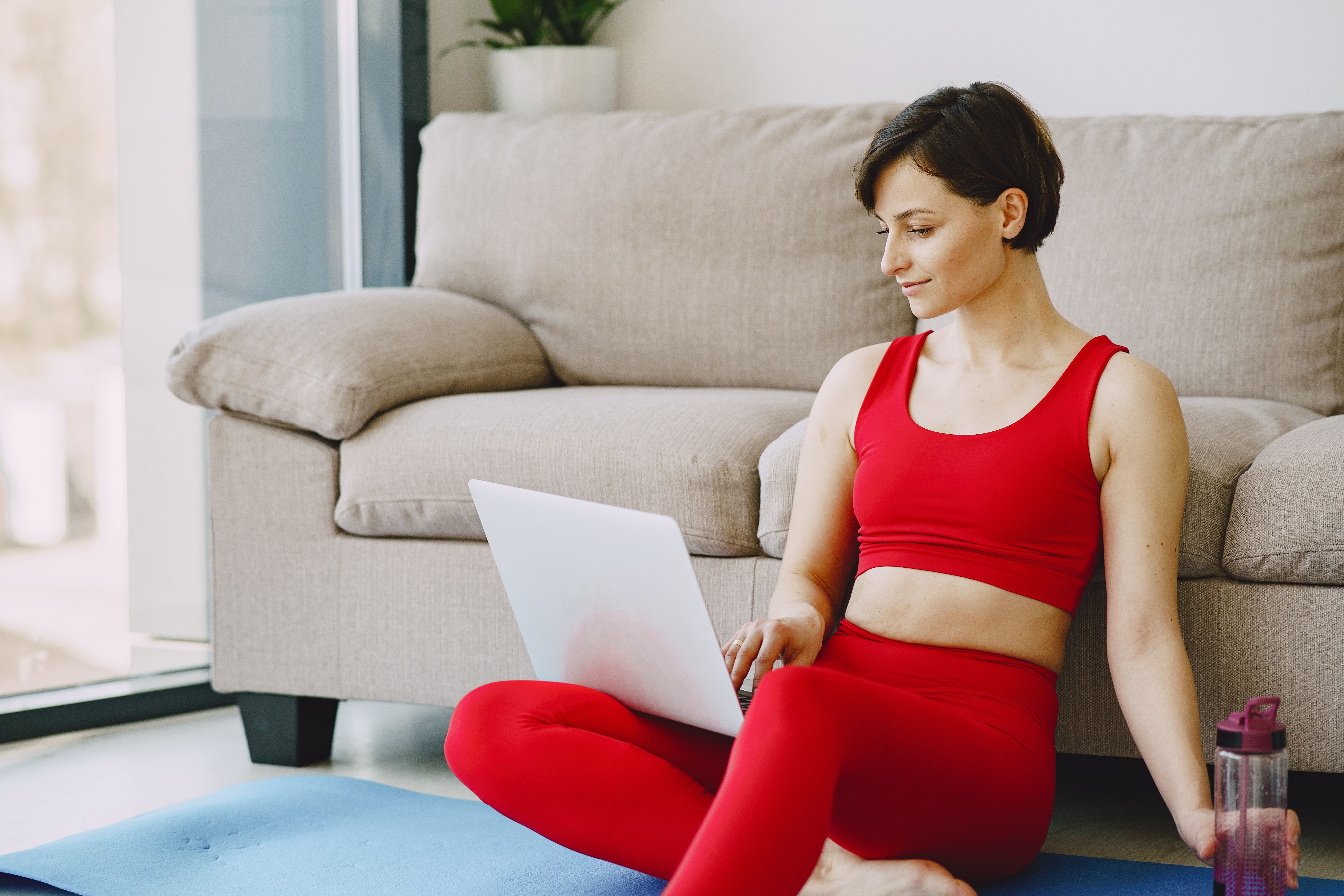 Pilates studio owner on laptop
