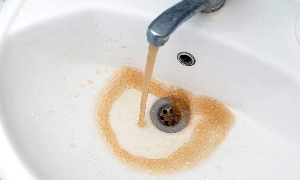 Why Is My Tap Water Brown and Rusty? Common Causes and Fixes
