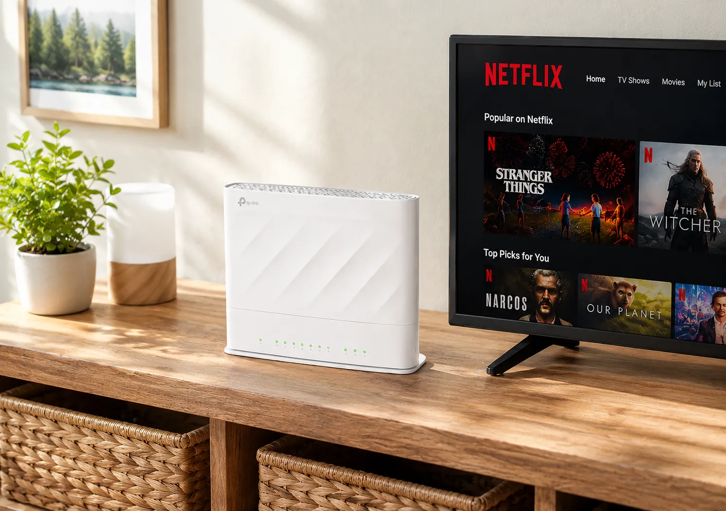 White TP-Link router on wooden desk next to TV showing Netflix main screen with popular shows.