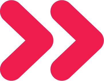 Two red chevron arrows pointing to the right on a transparent background.