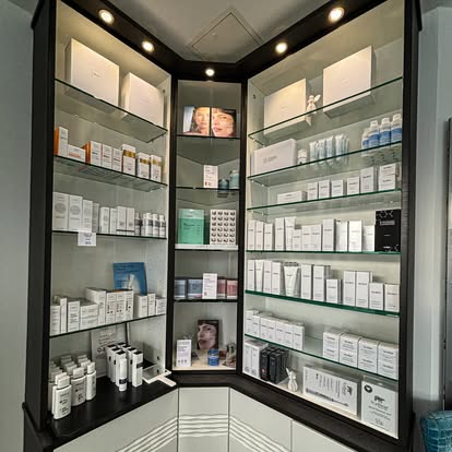 Skincare product display shelves at Fab Clinic