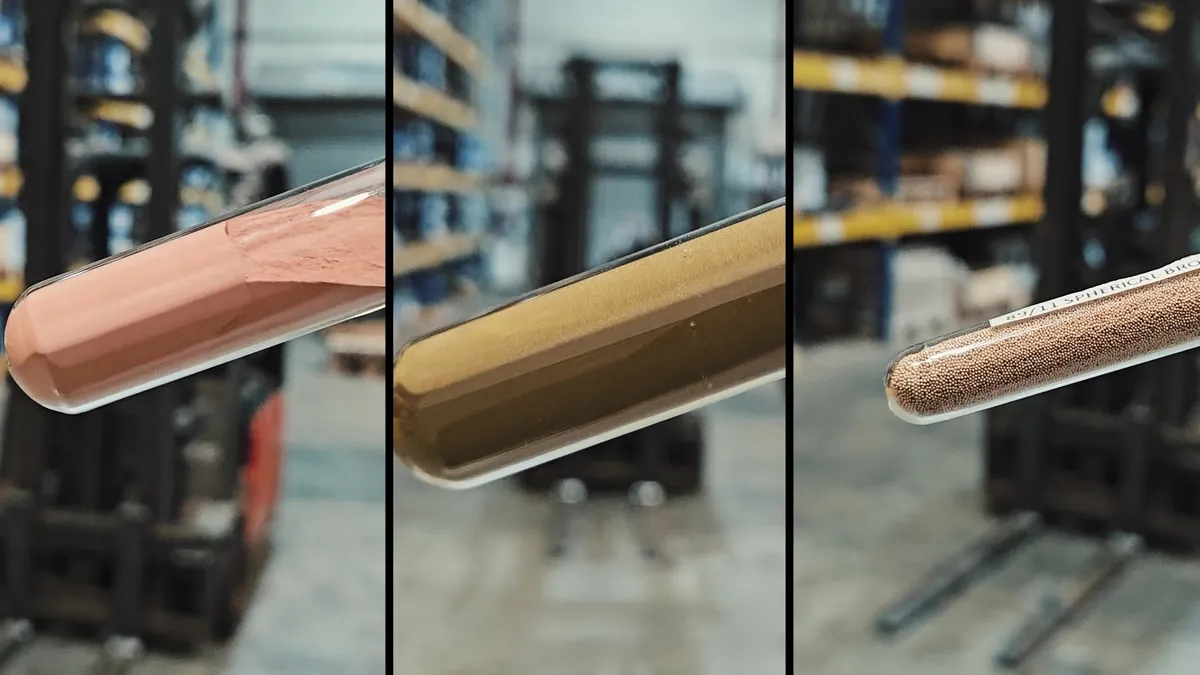 Copper, bronze and tin powder in glass vials in the Ronald Britton warehouse
