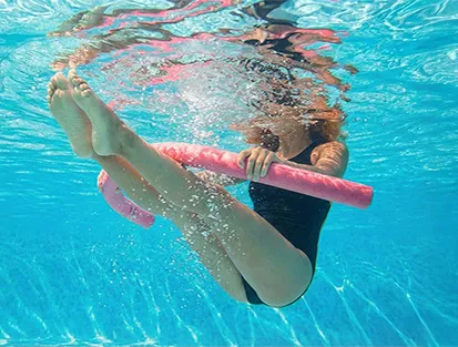 Person practicing water fitness at the Mahogany Hôtel Résidence & Spa, Le Gosier, Guadeloupe.