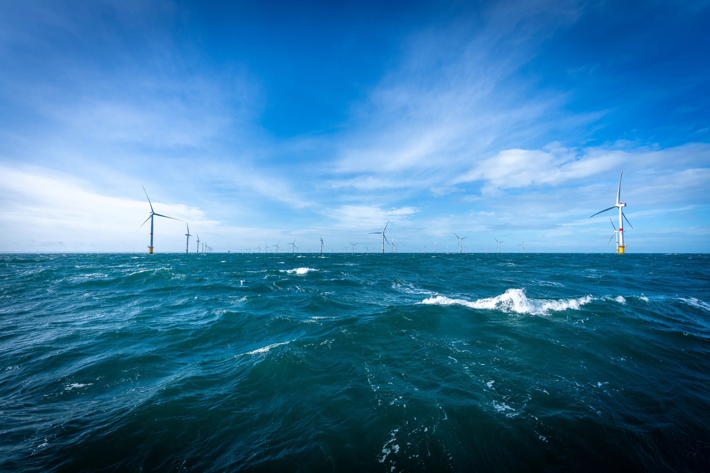 Fécamp offshore wind farm on the horizon, low waterline view. Credit: Ulrich Wirrwa.