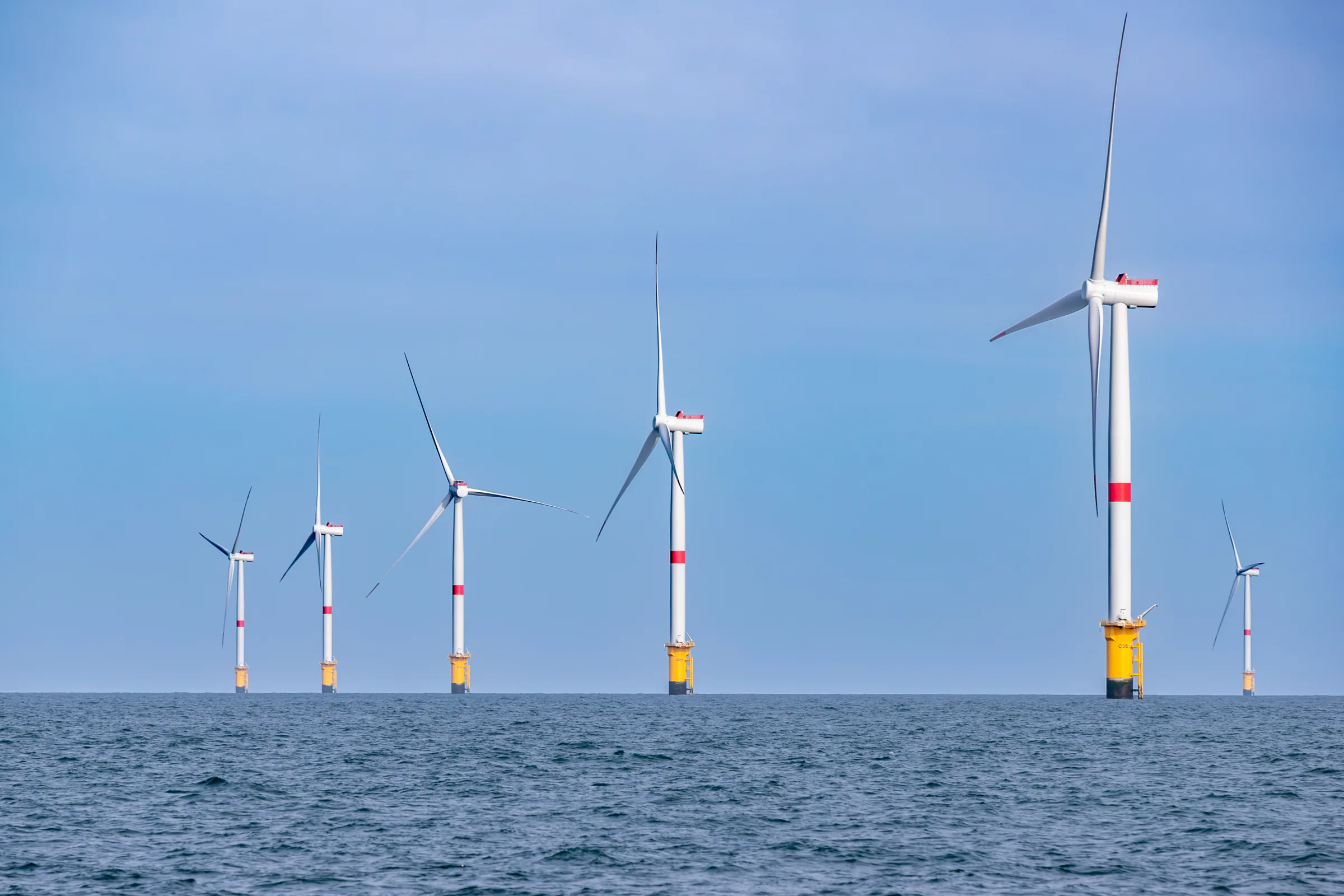Row of Fécamp offshore wind turbines at sea. Credit: Ulrich Wirrwa.