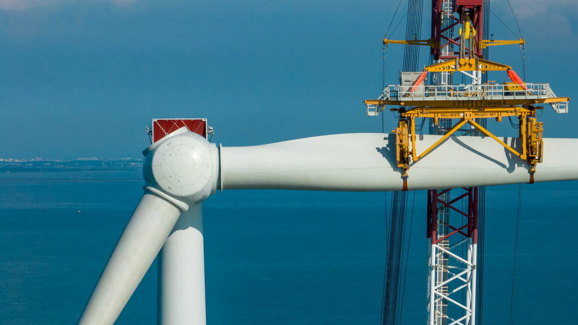Nacelle being lifted by jack-up crane during turbine installation at OWF Yunlin. Credit: OWF Yunlin.