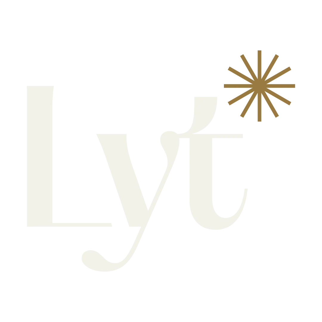 Light cream colored text 'Lyt' with a gold asterisk star symbol on white background.