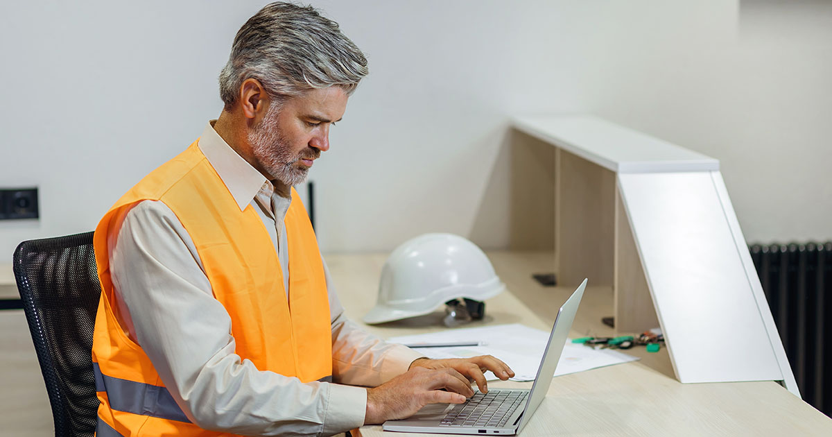 Home services business owner evaluating a marketing agency on a laptop