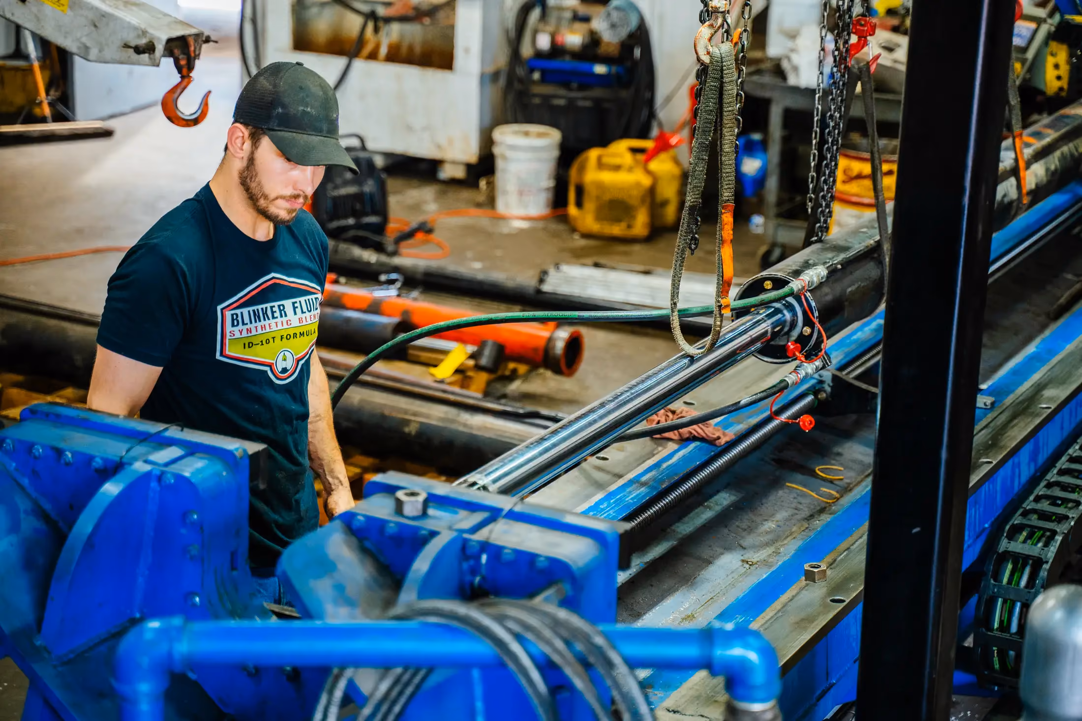 Mechanic performing hydraulic repair in Britton, MI