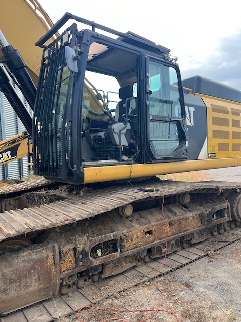Side view of Excavator under repair from Tristate Tuning and Service