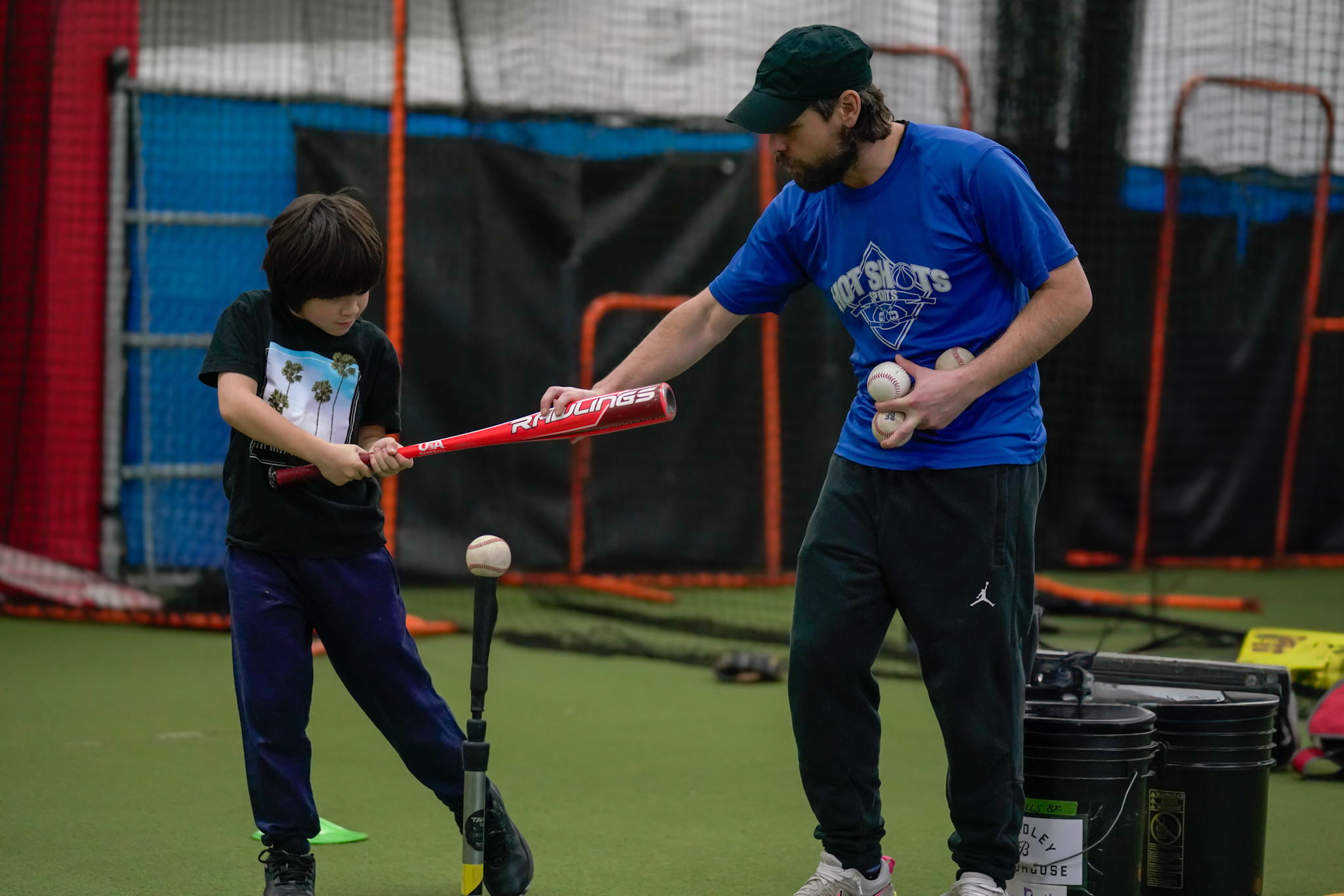 Youth baseball action at Windy City Sports Academy