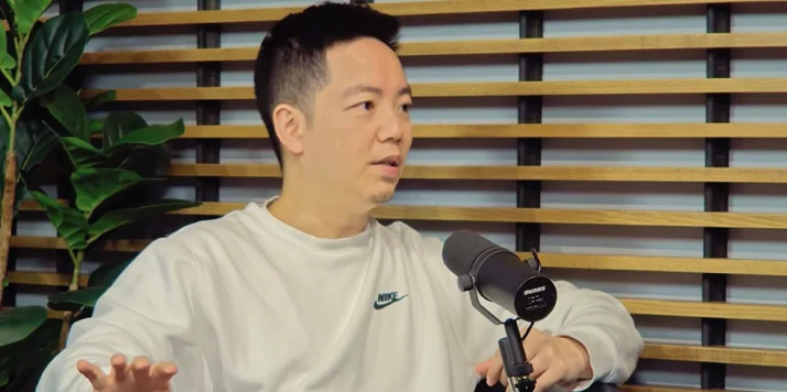 Nelson Lee speaks during a podcast discussion about AI in insurance.