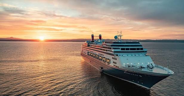 Fred. Olsen cruise ship at sea at sunset