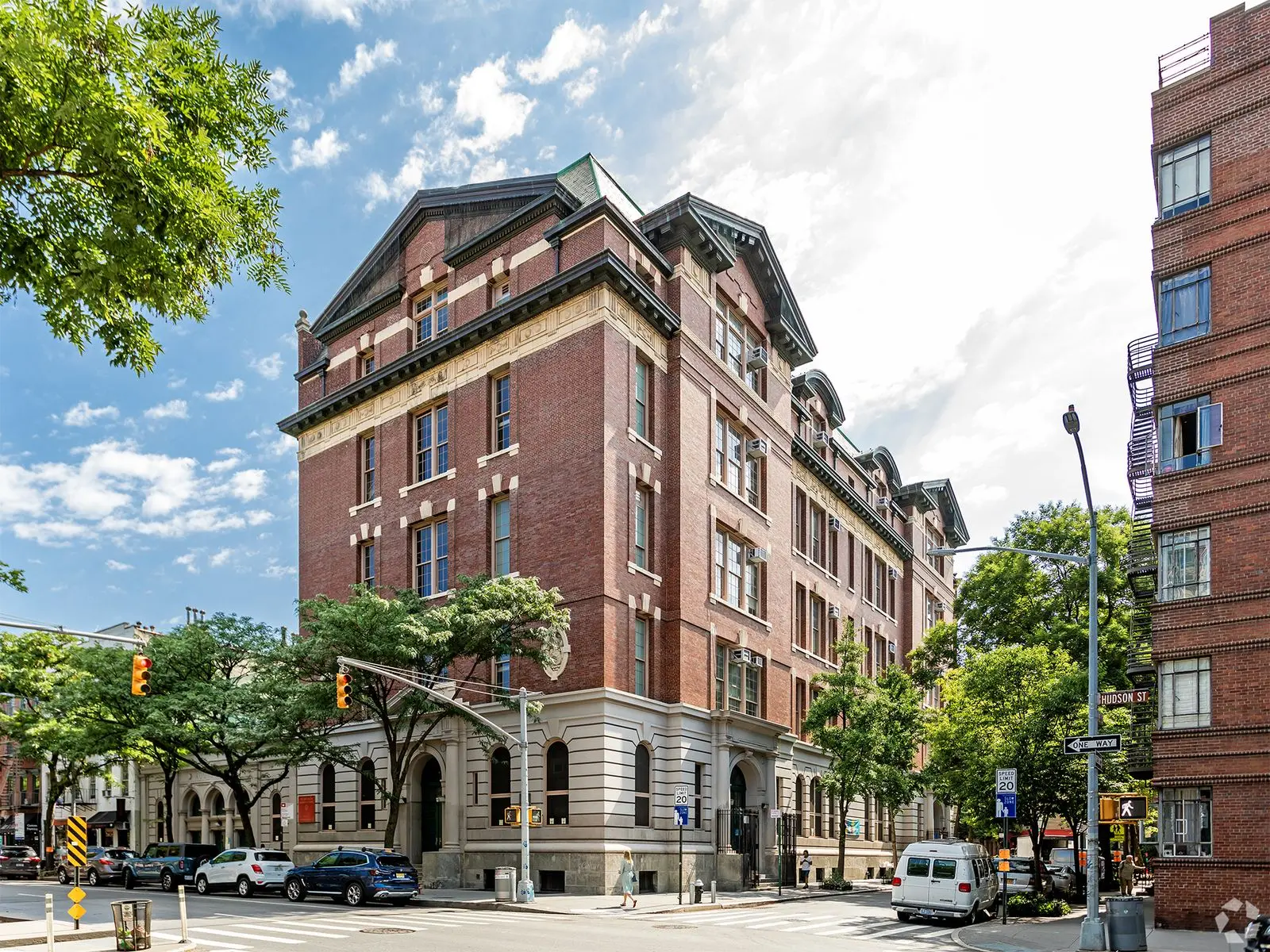 PS 3 historic red brick school building on Hudson Street corner