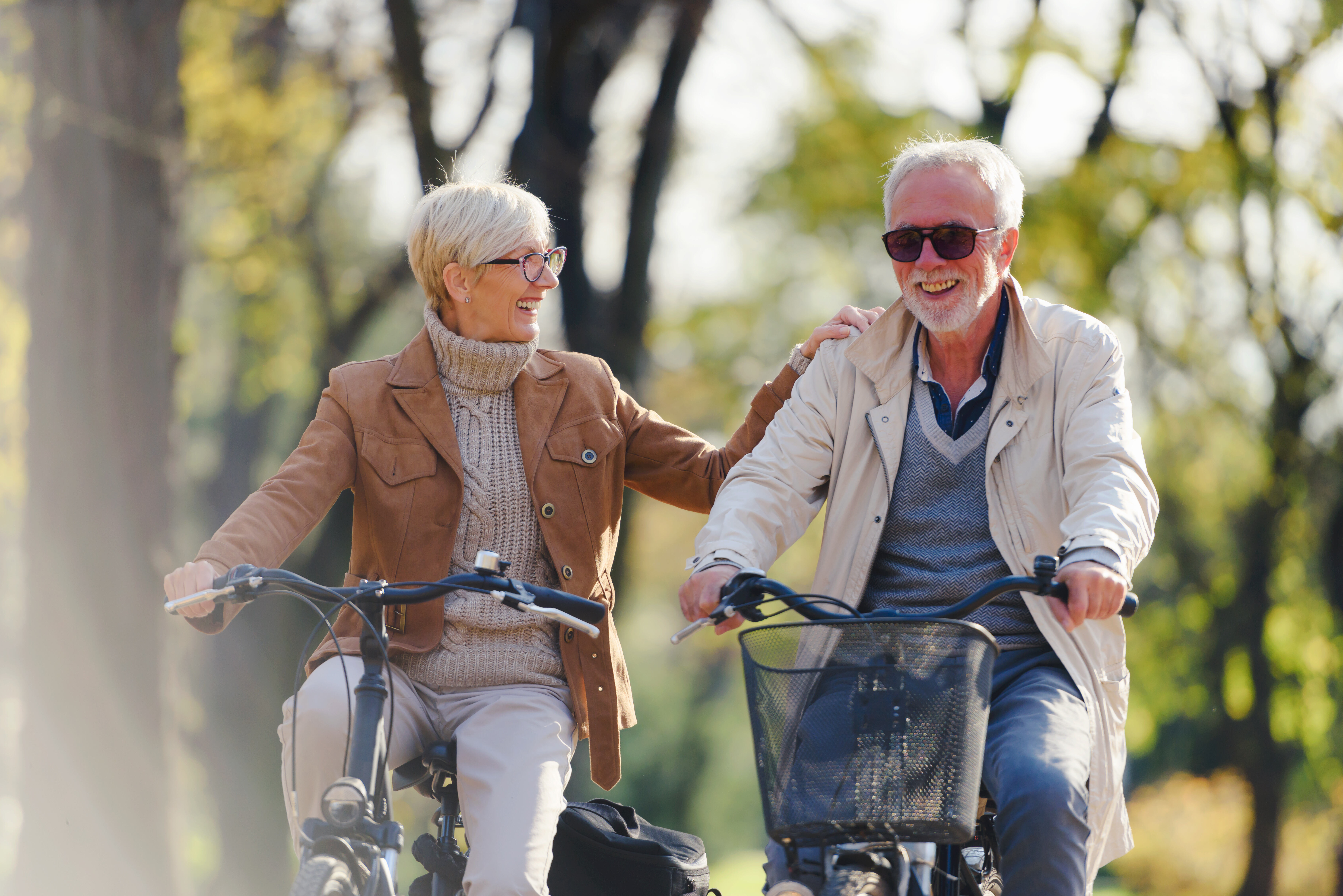 Senior couple riding bikes stock image