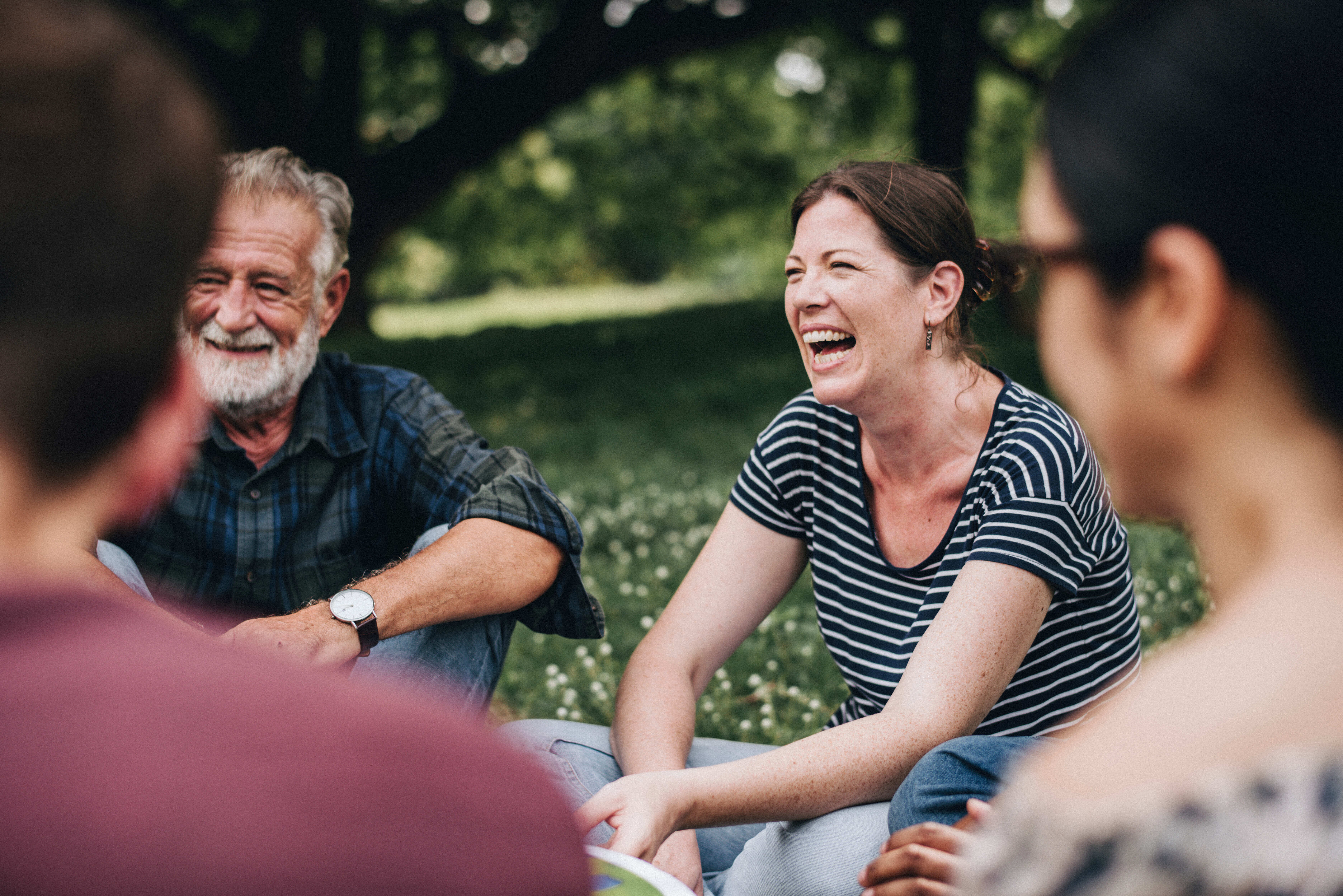 Seniors chatting outdoors stock image