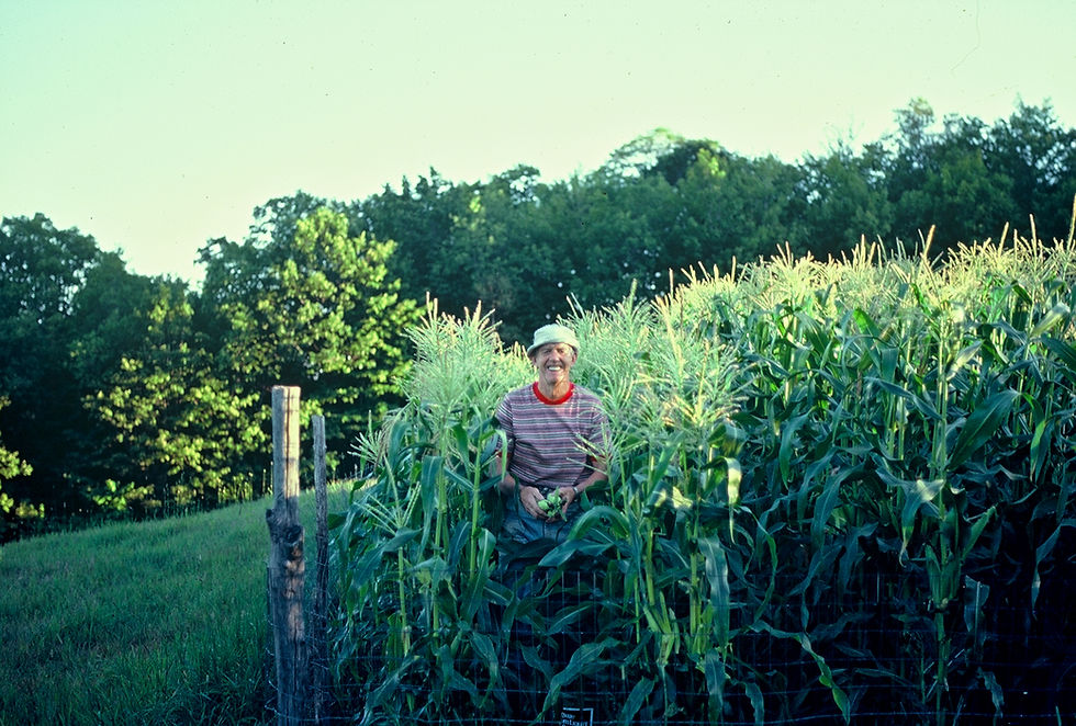 Uncle Royal stands proudly in the middle of his corn fields back at the family farm in Vermont