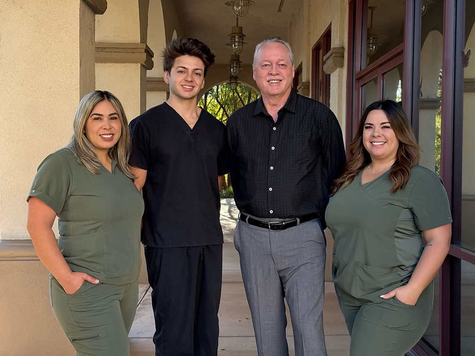 Dr. Dave Cutts, dentist in Temecula, is training up the next generation of dental healthcare professions, as shown here with some of his staff at The Center for Adult Dentistry