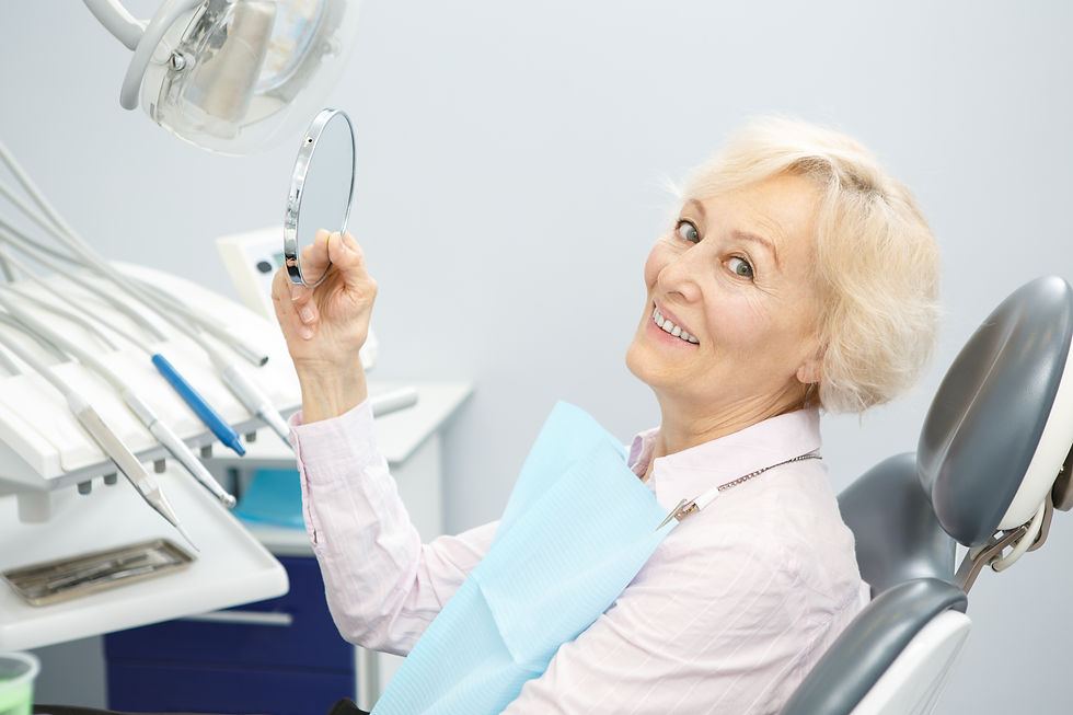 smiling senior woman in dentist office prioritizing oral health and a healthy smile as a part of self-care