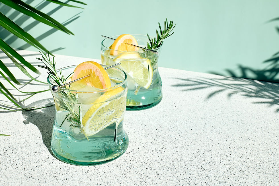 stay hydrated by adding citrus or herbal garnishes to your water like this lemon rosemary water