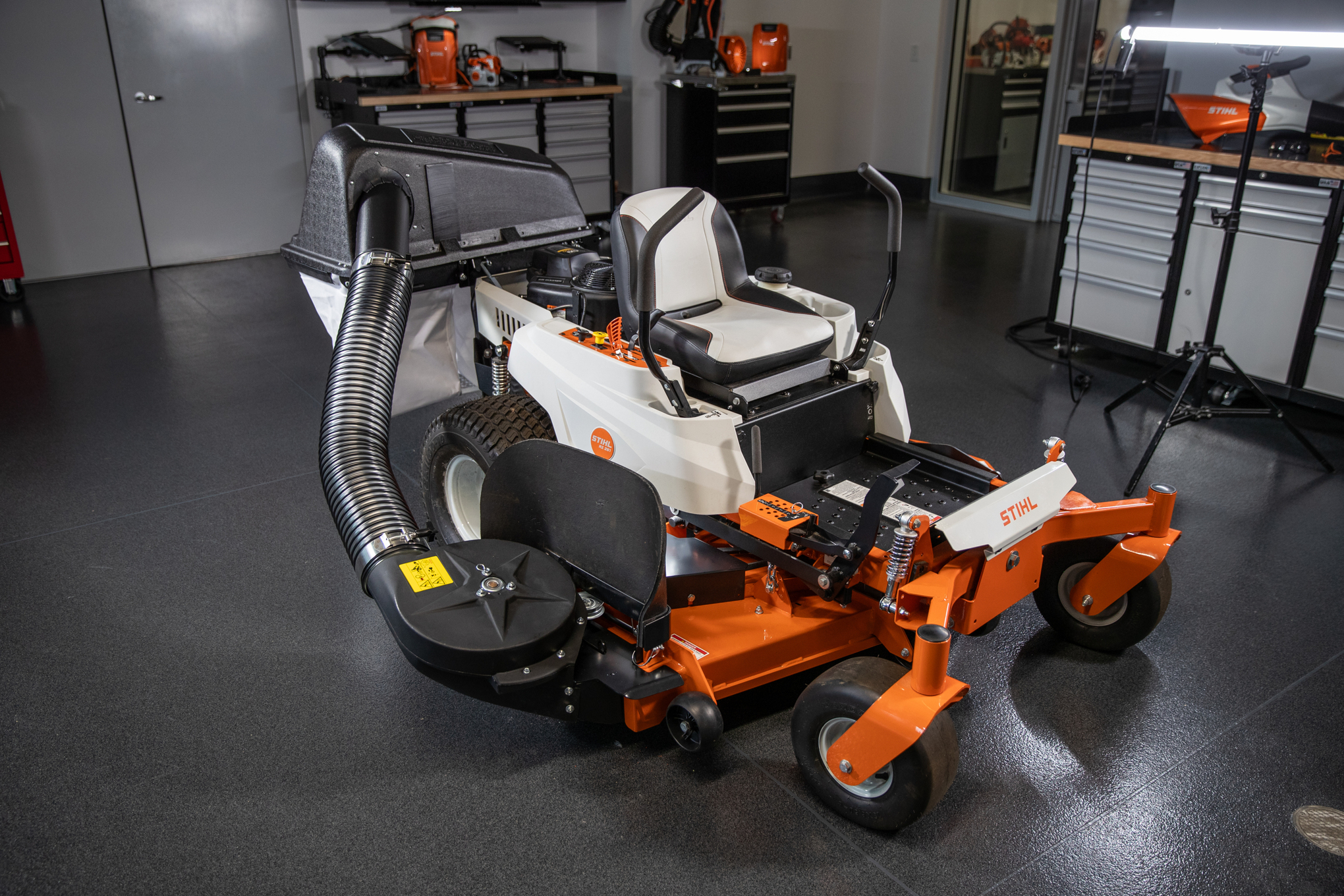 This blower pushes grass clippings into the RZ collection bags.