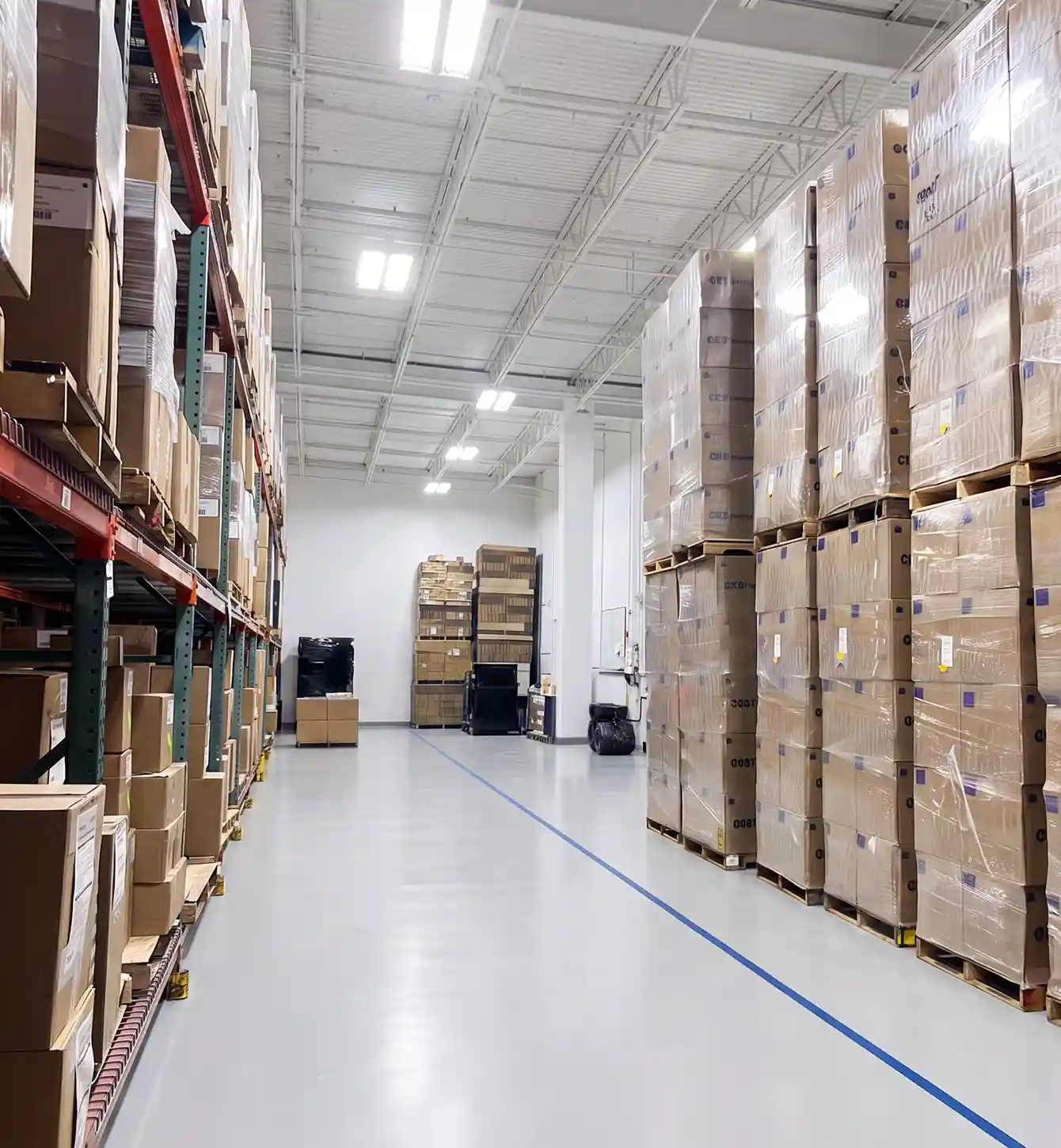 Warehouse aisle with racked pallets