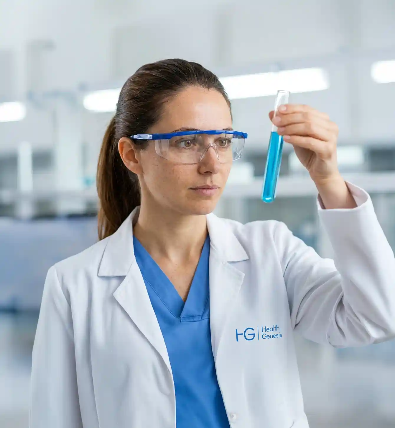 Laboratory technician in safety glasses and a lab coat