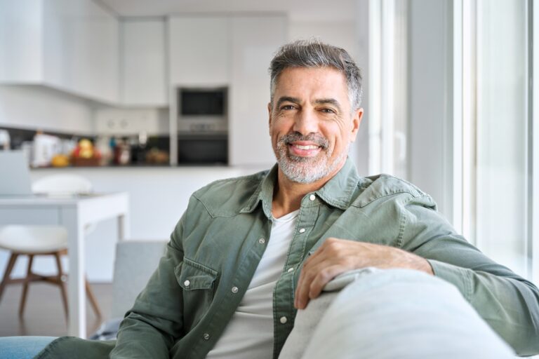 Healthy man sitting on a couch