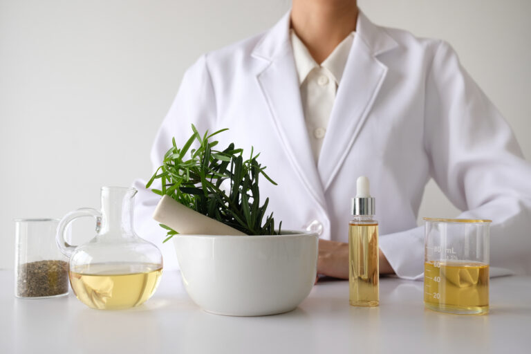 Supplement scientist with supplements on a table
