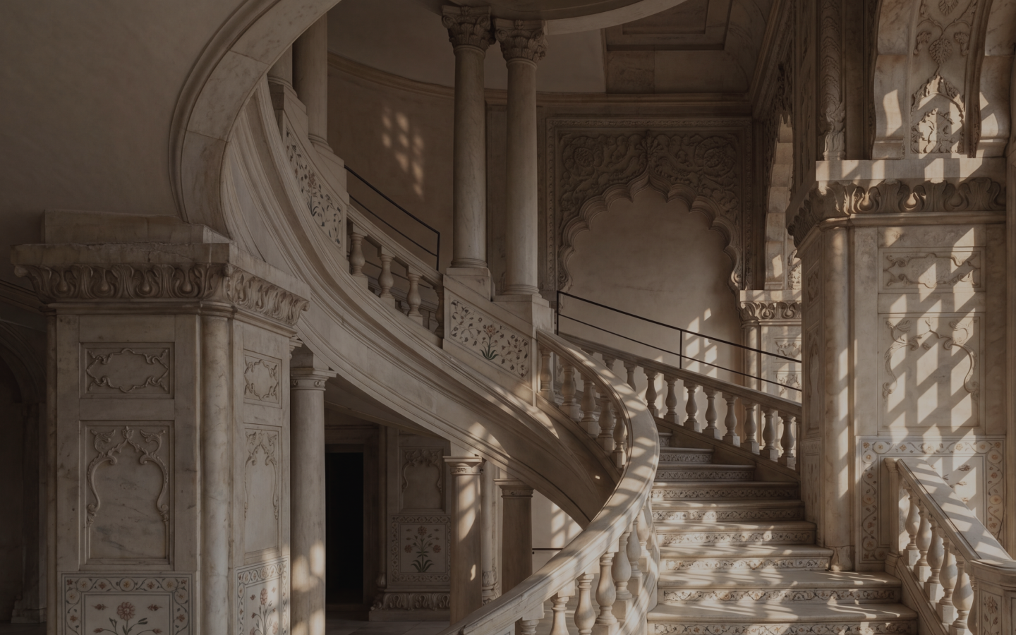 Ornate marble staircase in a palatial interior
