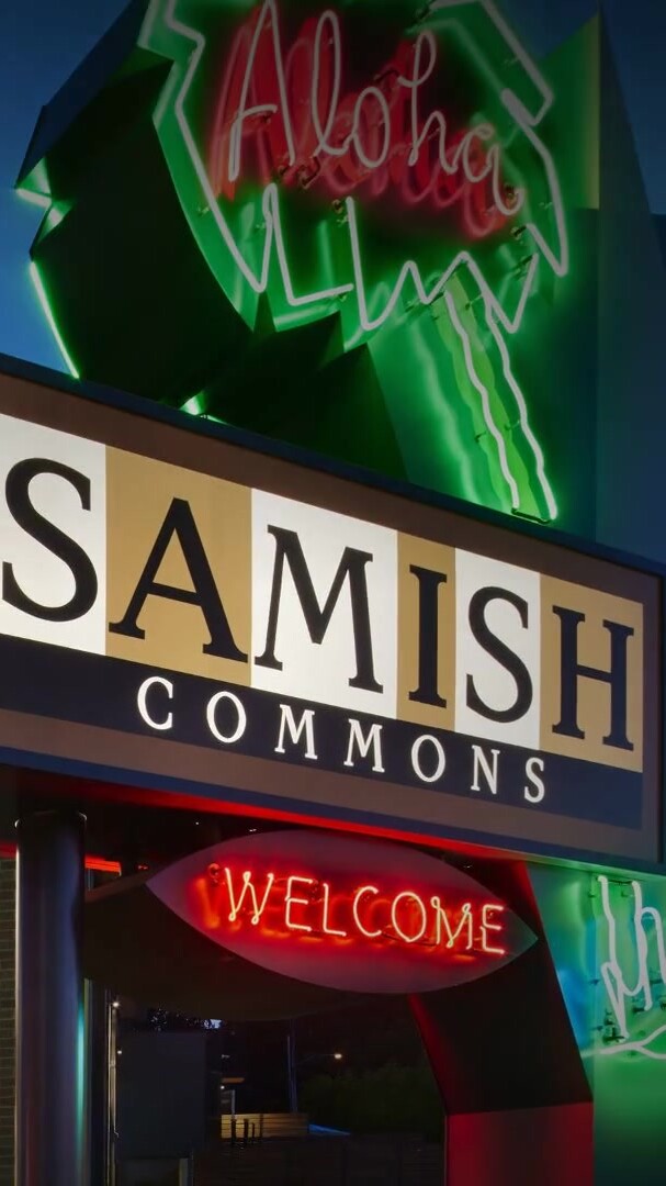 The restored Aloha neon sign above the Samish Commons sign
