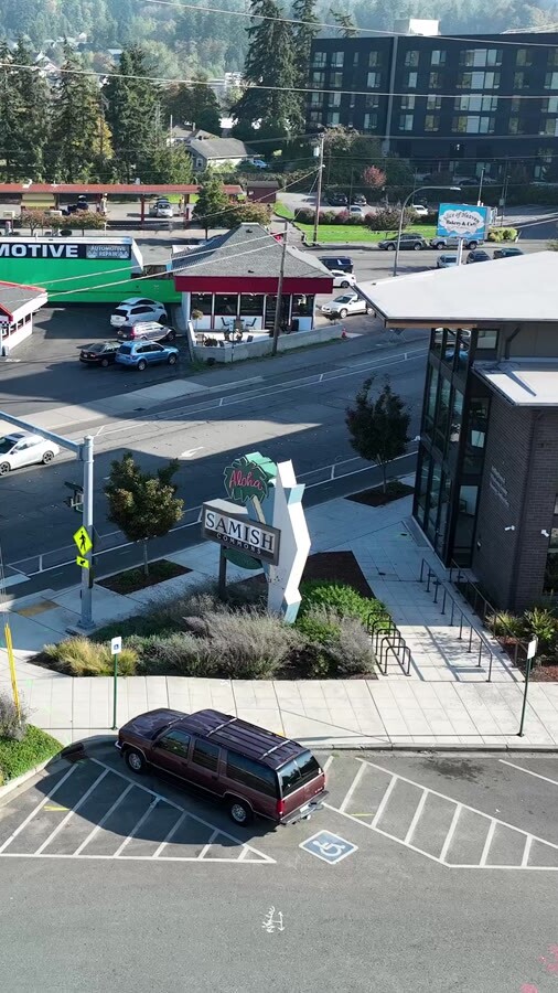 Drone shot of the Samish Commons sign at the corner of Samish Way