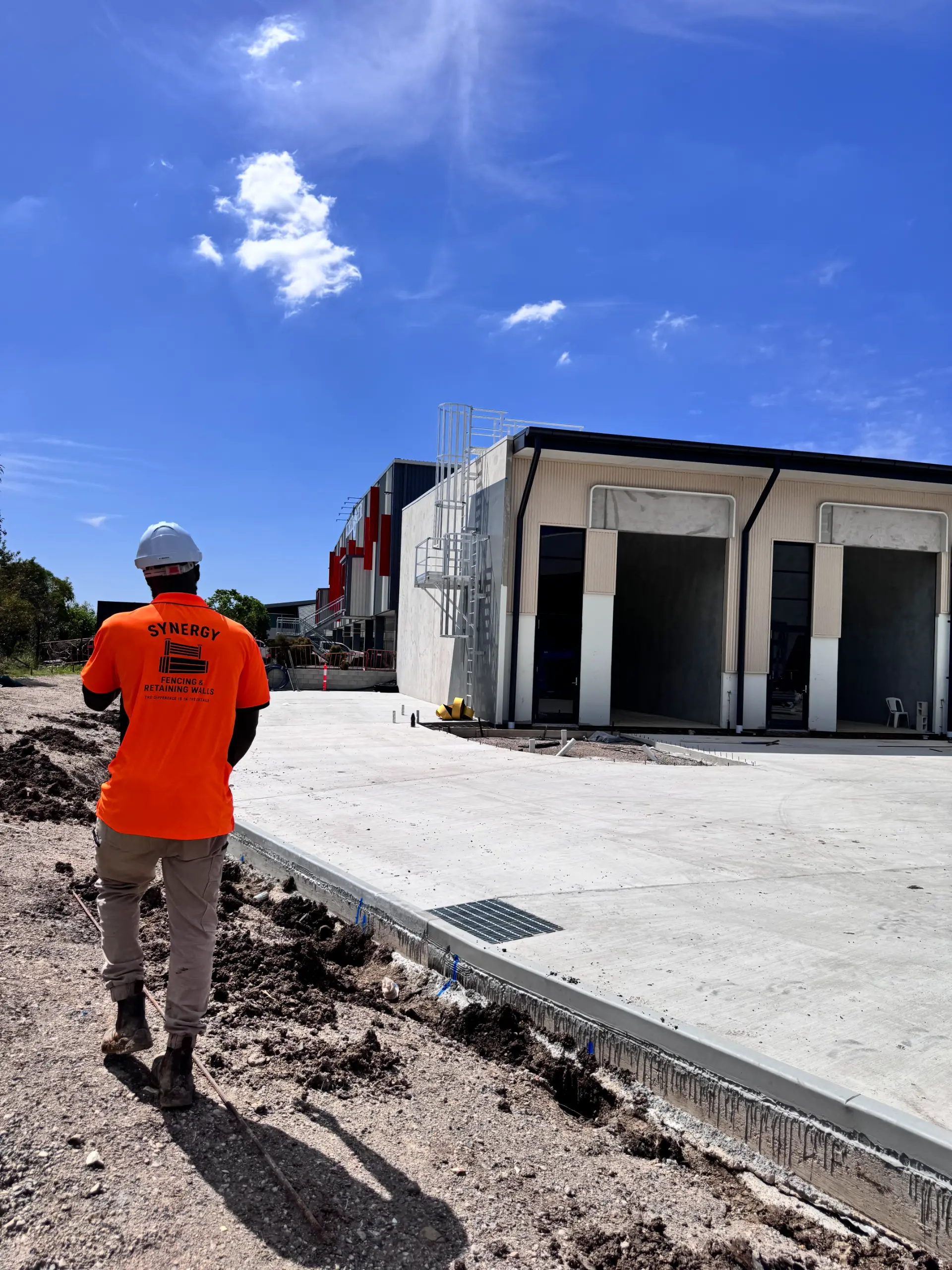 Patrick, founder of Synergy Fencing, on site in Brisbane