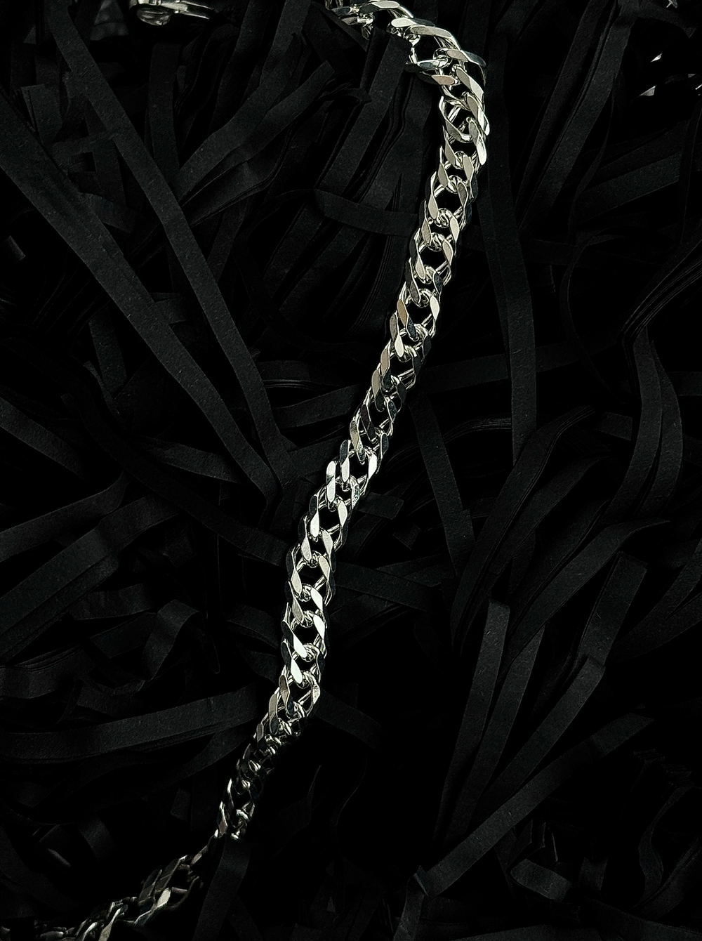 Modern double link necklace with interlocking chain design, offering a bold and timeless style.