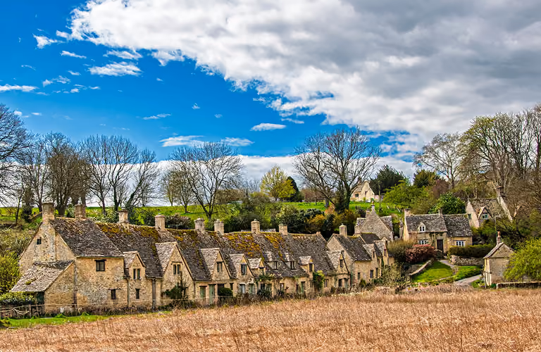 Cotswolds most famous street, Arlington Row on a bright sunny day.