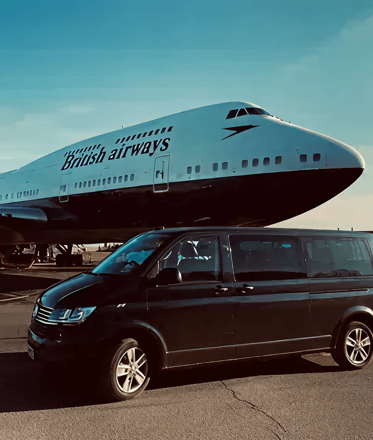 A Corf Travel van infront of a British Airways Boeing 747