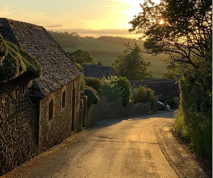 Sunset on a road in Snowshill