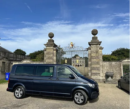 Corf Travel van parked infront of gates at Lodge Park on the Sherborne Park Estate