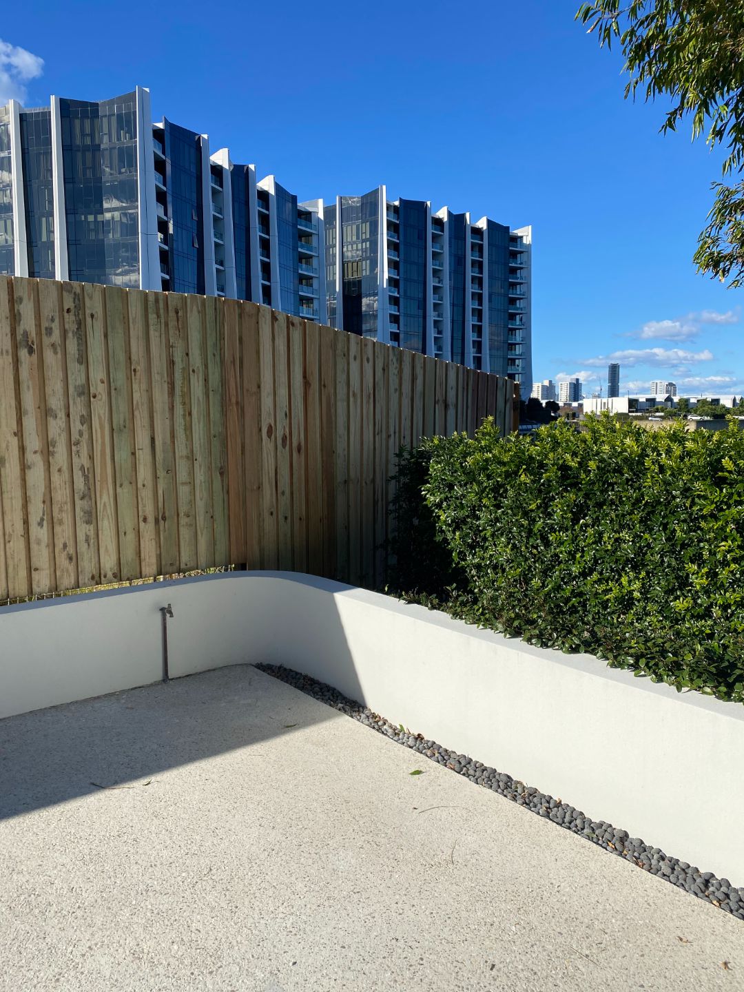 Commercial timber batten fencing installed by Synergy Fencing on a Brisbane rooftop terrace