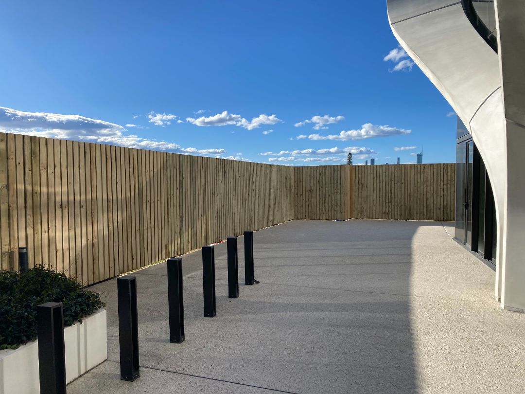 Aluminium slat commercial fencing installed by Synergy Fencing on a Brisbane rooftop