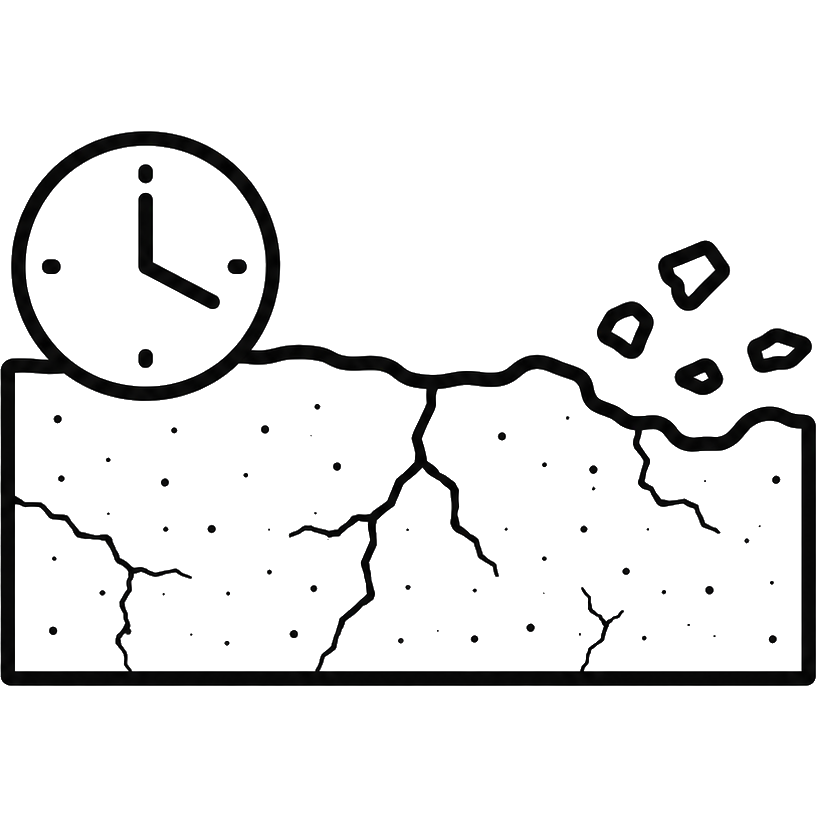 Clock beside a cracked, crumbling wall