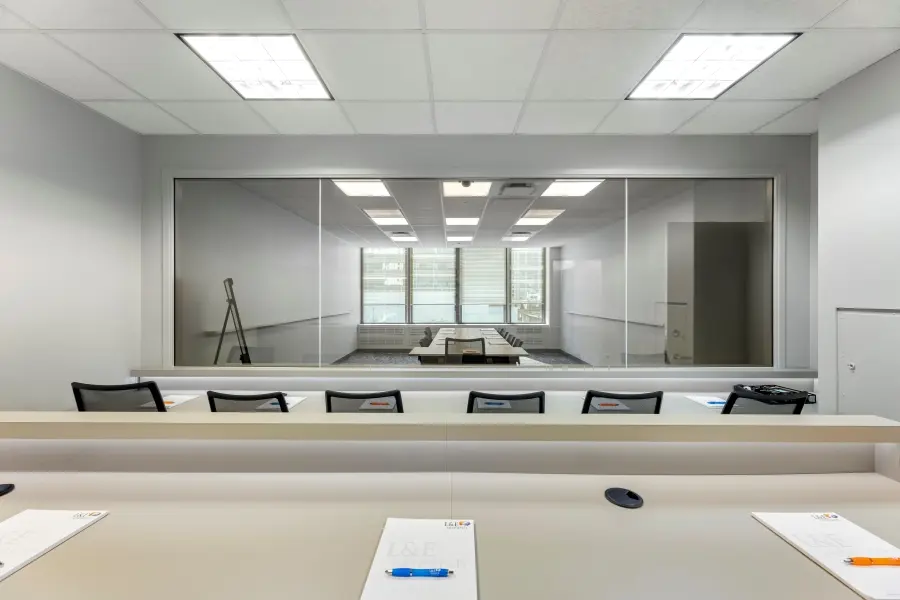 Standard client observation booth behind a one-way mirror in the Wrigley Field suite at L&E Research's downtown Chicago facility.
