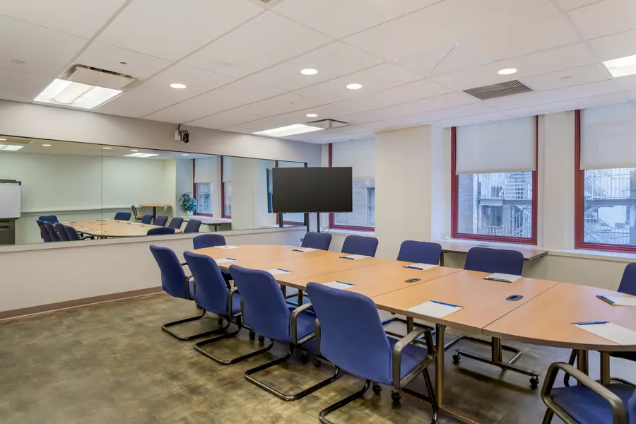 Spacious focus group suite at L&E Research in Midtown Manhattan, featuring comfortable participant seating and professional presentation amenities.