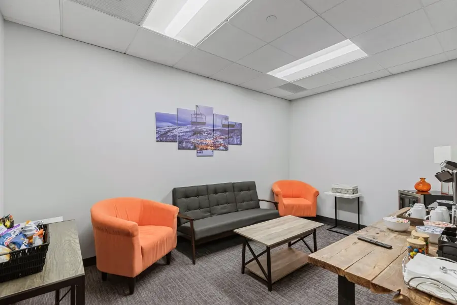 Premium client observer lounge in the Vail suite at L&E Research Denver, providing private workspaces and feeds for remote or local observers.