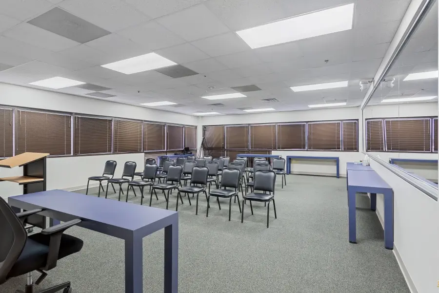 Spacious focus group room rental within the Tampa Bay suite at L&E Research Tampa, configured for consumer insights and participant panels.