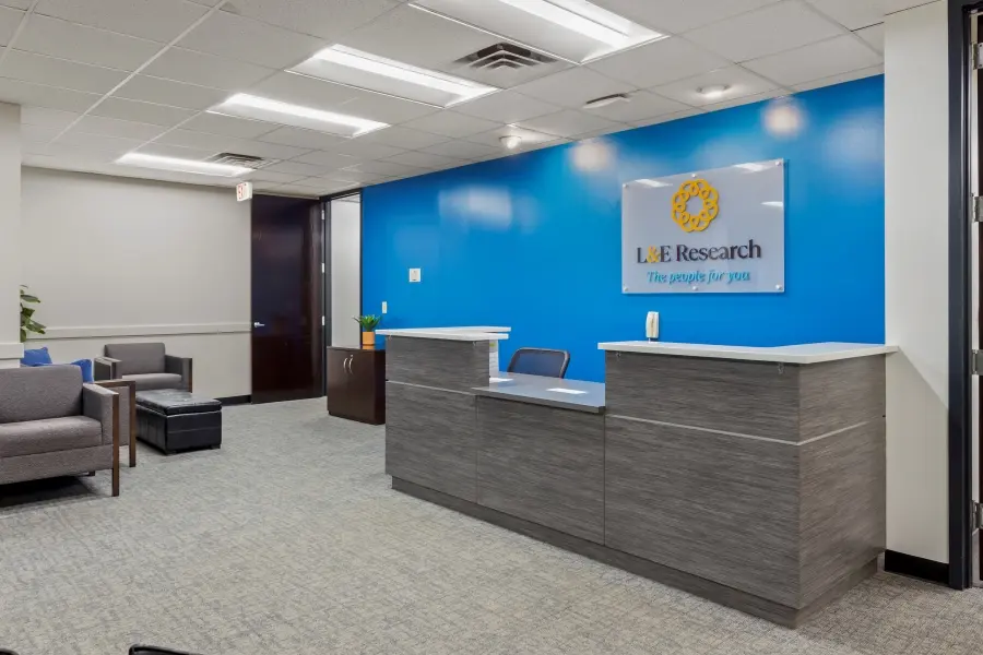 Branded reception desk at the L&E Research Raleigh market research facility