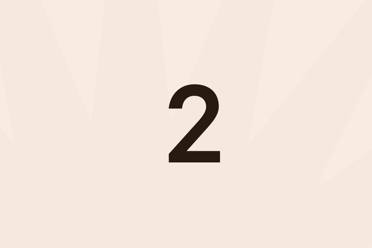 Black number 2 centered on a light beige background with starburst design.