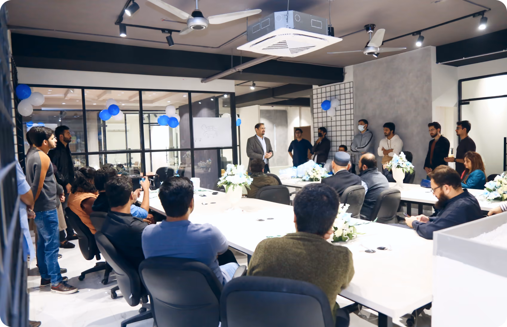 Team all-hands meeting at the ExperLabs office